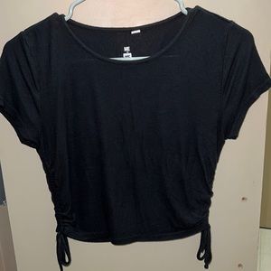 Black shirt with adjustable sides